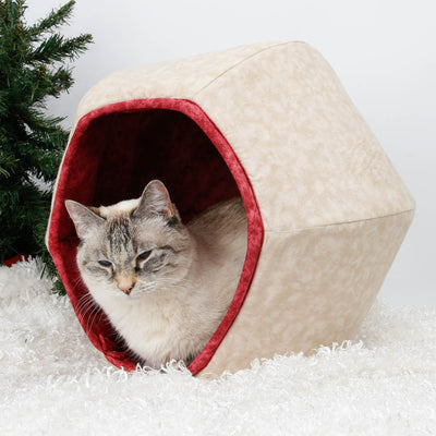 This Cat Ball® cat bed is made with neutral ivory and lined with wine-colored red. These cotton fabrics have interesting textures creating a dimension look to the subtle tonal prints