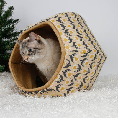 Give your cat an authorized spot under the Christmas tree with the Cat Ball® cat bed! Our innovative cat cave is made in the USA with cotton fabrics over half-inch foam and  is loved by cats around the world. Our cute cat bed makes a great present for cats and cat lovers.
