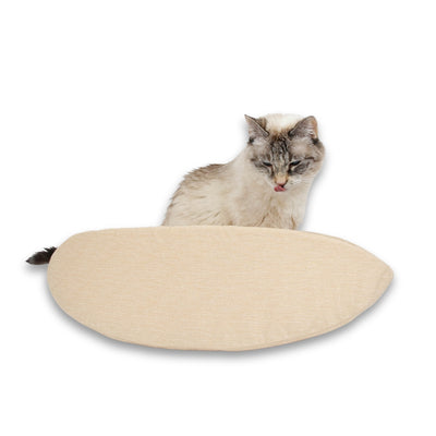 The Cat Canoe® made with neutral butter-colored cotton fabrics. Our innovative modern cat bed is made in the USA with cotton fabrics over flexible foam panels and fits pets to about 18 pounds. Our taco-shaped pet bed is ready to ship.