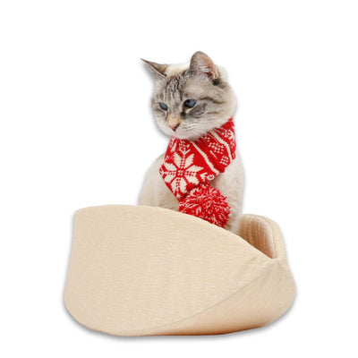 The Cat Canoe® made with neutral butter-colored cotton fabrics. Our innovative modern cat bed is made in the USA with cotton fabrics over flexible foam panels and fits pets to about 18 pounds. Our taco-shaped pet bed is ready to ship.