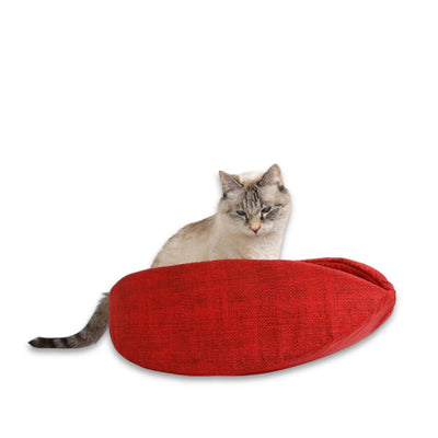 Our standard-size Cat Canoe® taco-shaped cat bed is made with red burlap-look cotton inside and out and finished with hand-cut bias tape. This flexible modern cat bed is designed for cats up to 18 pounds and is made in the USA. 