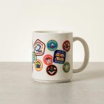 Retro Bookworm Badge Ceramic Mug 1