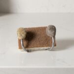 Suction-mounted Sea Stone Sink Sponge Holder 1